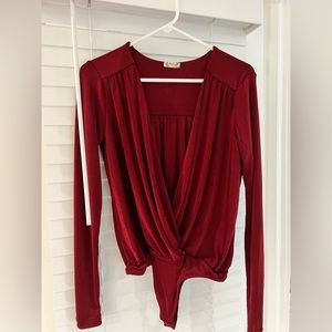 NWT free people burgundy “turnt” bodysuit, wrap front, very berry size medium